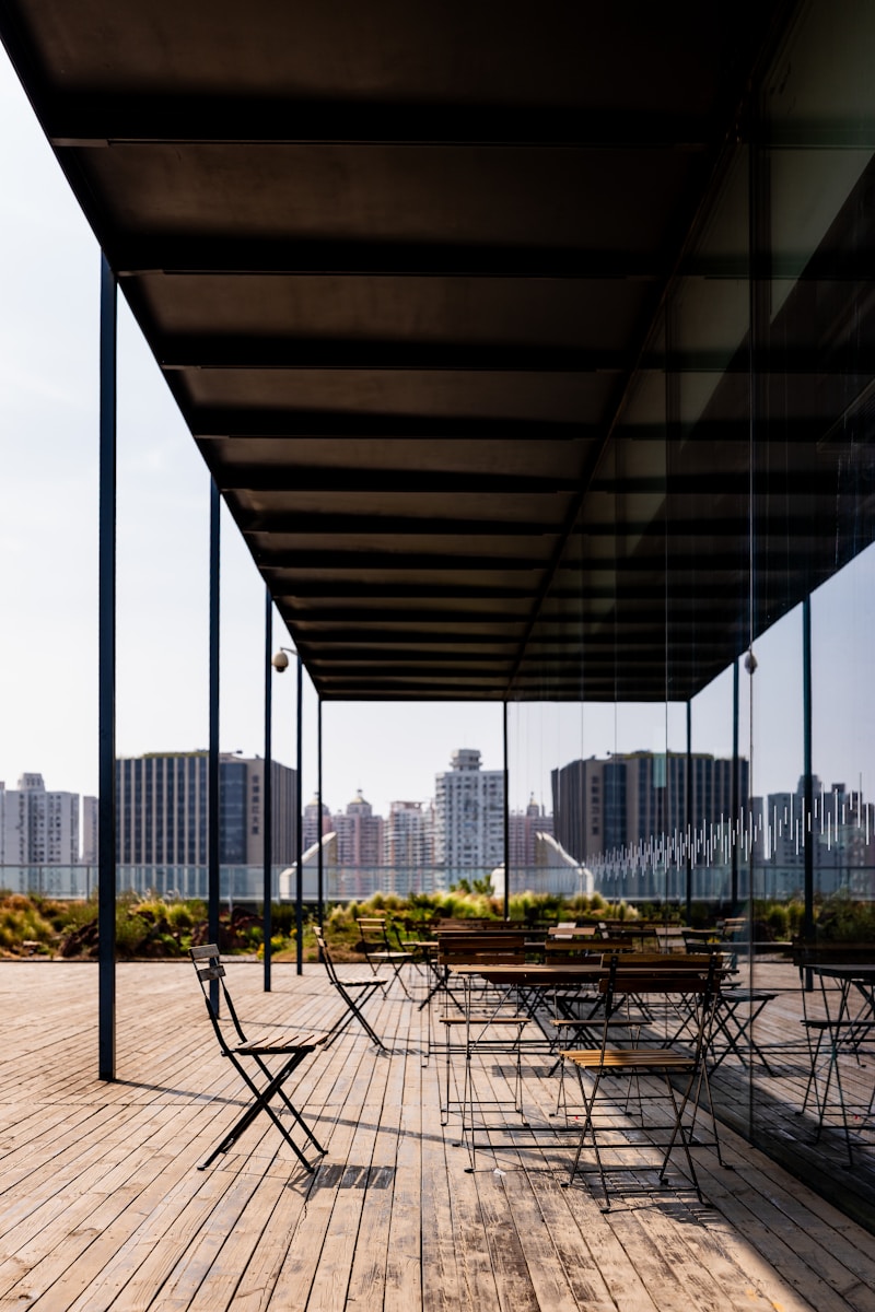 Outdoor cafe with a skyline view.